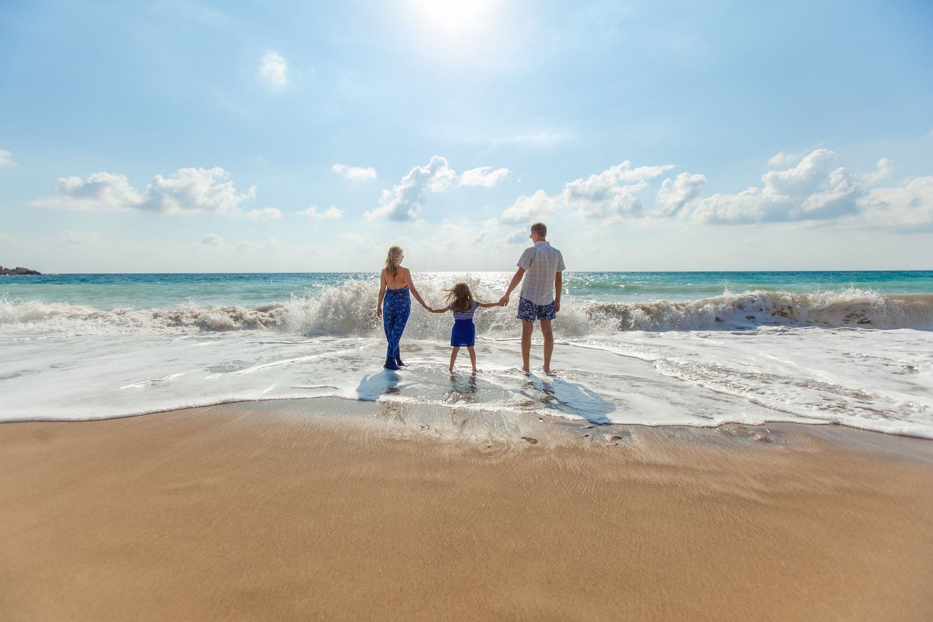 Happy family at the beach.